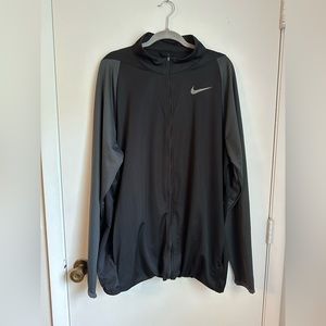 Nike Men's Training Jacket Dri Fit - 2XL
Style: 928026-010 Black w. gray sleeves